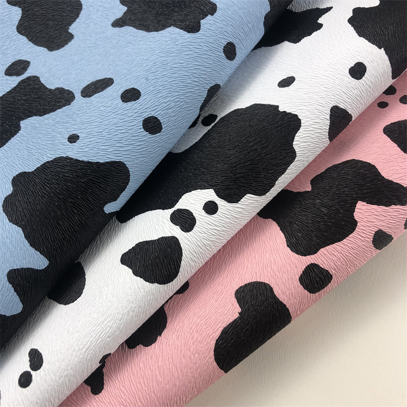 Direct selling milk cow print half PU wool sole