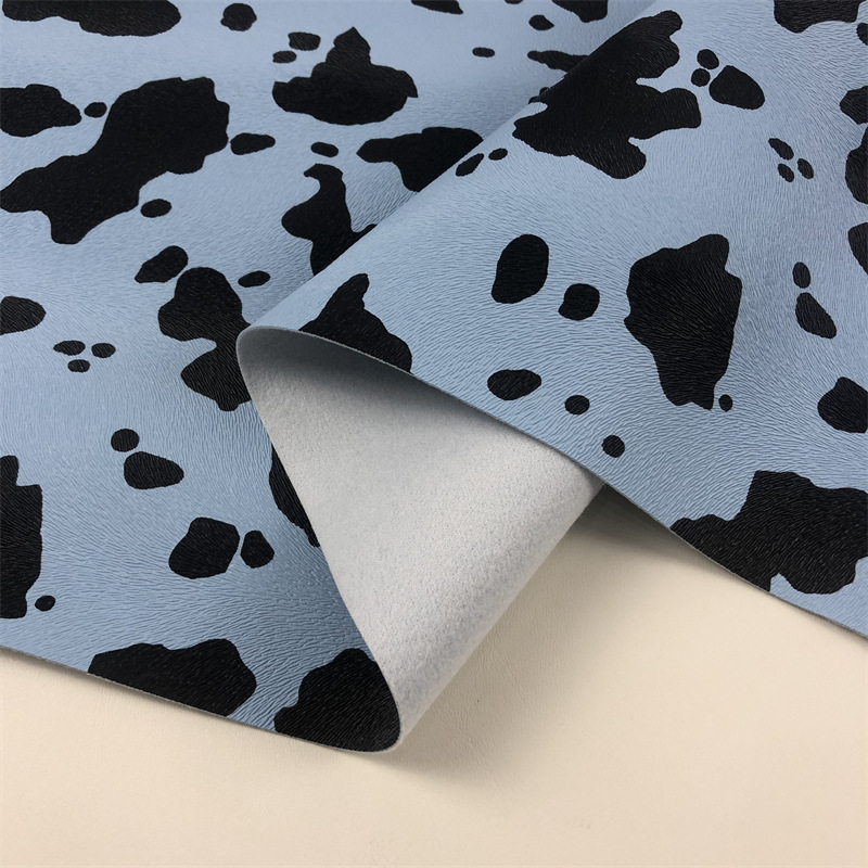 Direct selling milk cow print half PU wool sole