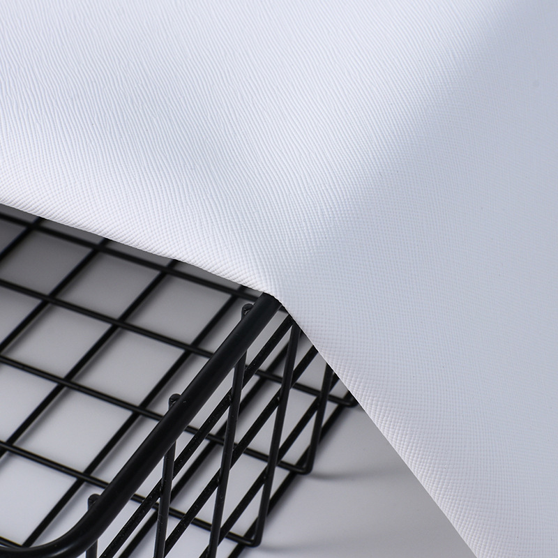 0.7 White cross stitch print faux leather